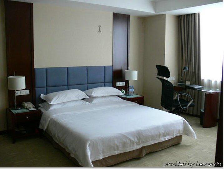 New Land Business Hotel Wuhan Camera foto